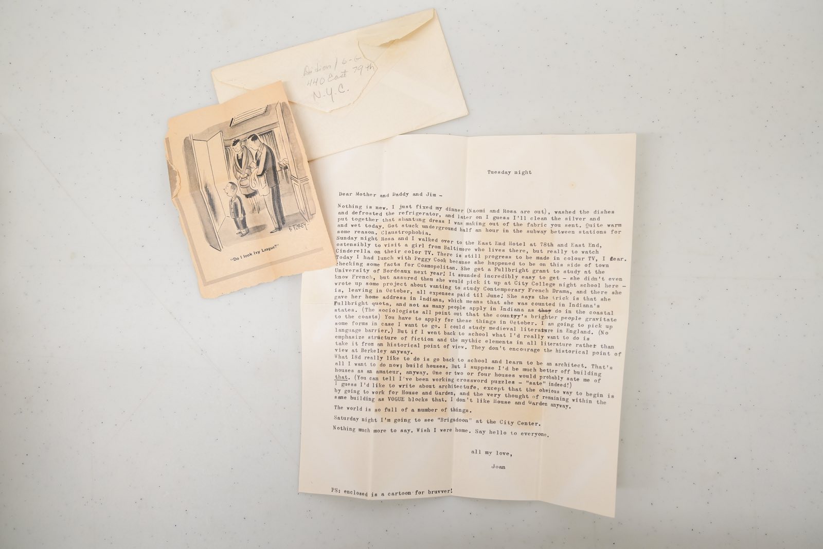 Letter and clipping from Joan Didion to her family during her early years at Vogue, 1957