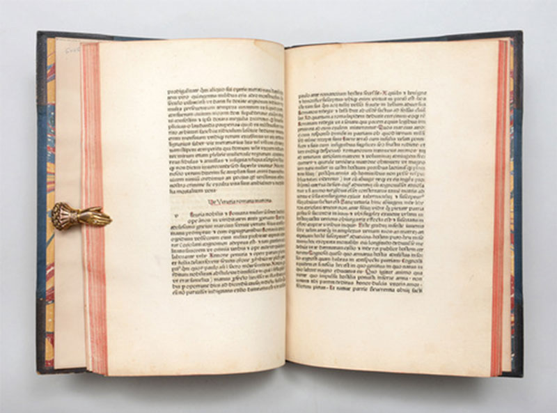 book with hands