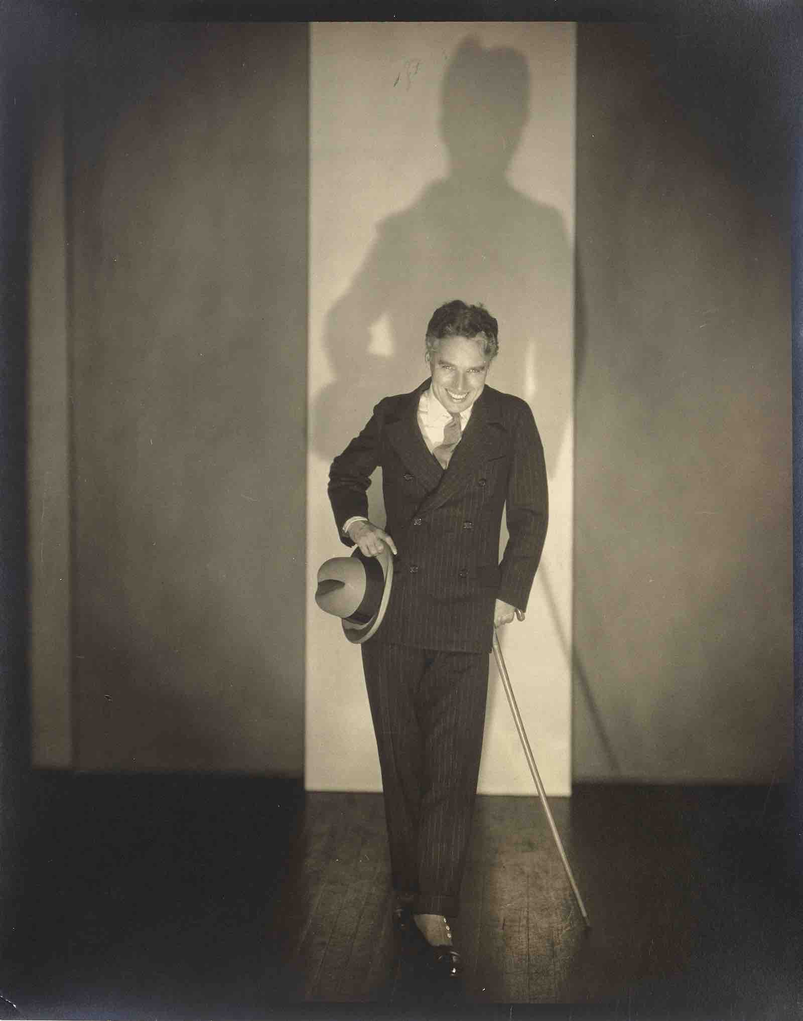 Charlie Chaplin photographed by Edward Steichen, one of three photographs of Chaplin. Estimate: £2,000-4,000