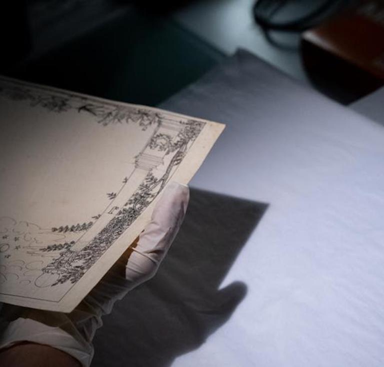 The work of Hercule Florence being examined in the laboratory 
